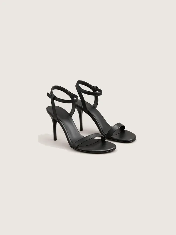 AI-generated product photo of the black barely-there, one of the pieces in the Someone Shop.