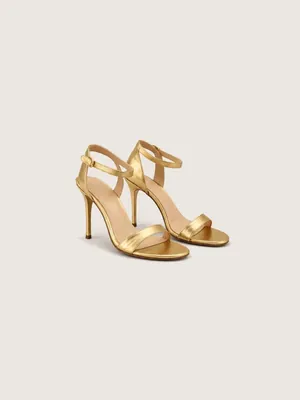 AI-generated product photo of the metallic gold barely-there, one of the pieces in the Someone Shop.