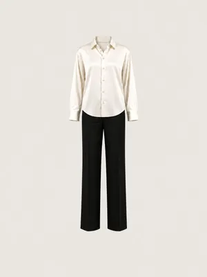 AI-generated product photo of the ivory silk button-up, one of the pieces in the Someone Shop.